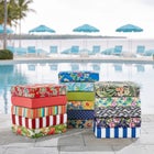 Multiple outdoor seat cushions displayed outdoors