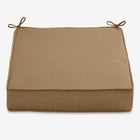 Single deep seat cushion in solid tan/brown fabric