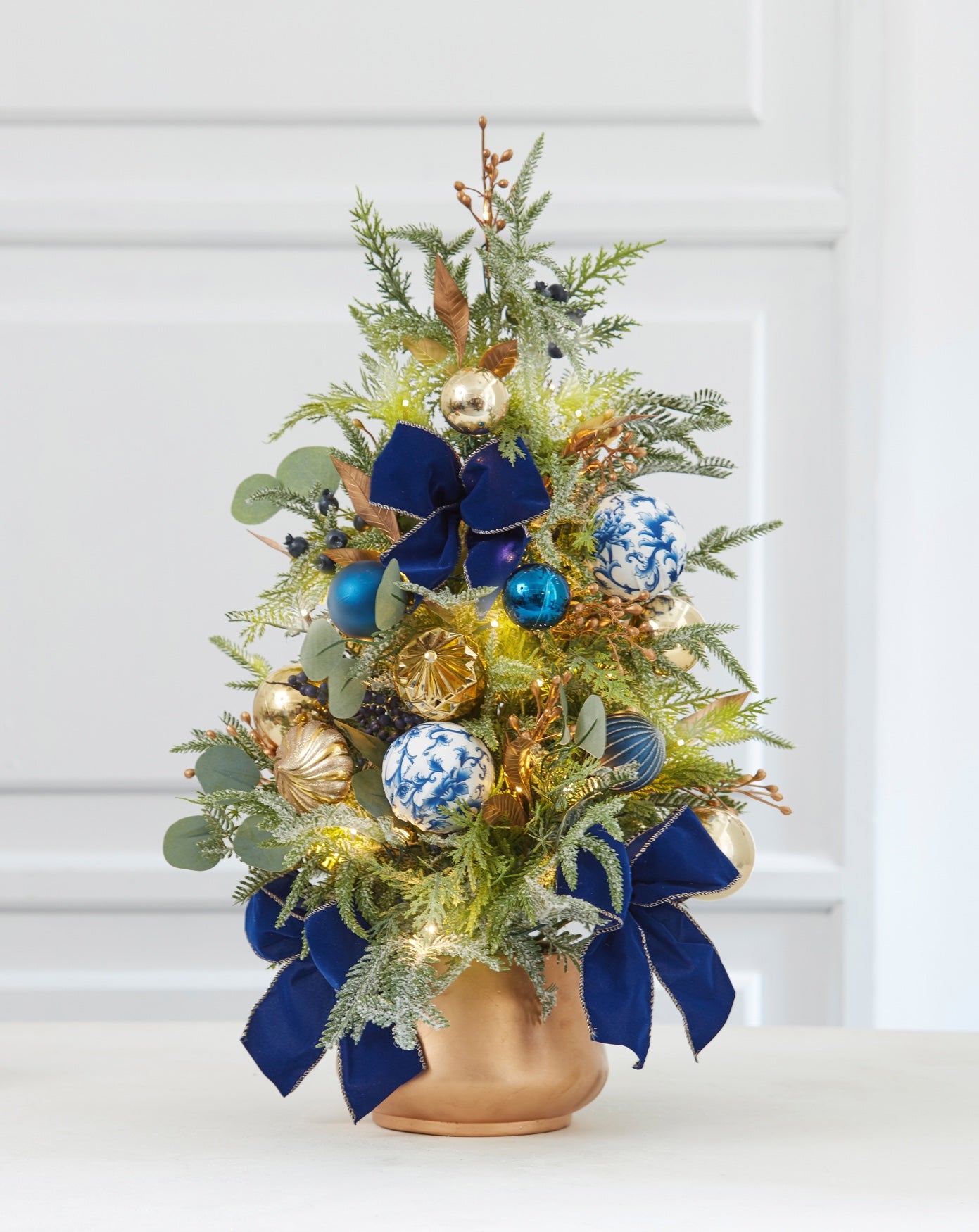30" Pre-Lit Midnight Blue Urn Tree image number 0
