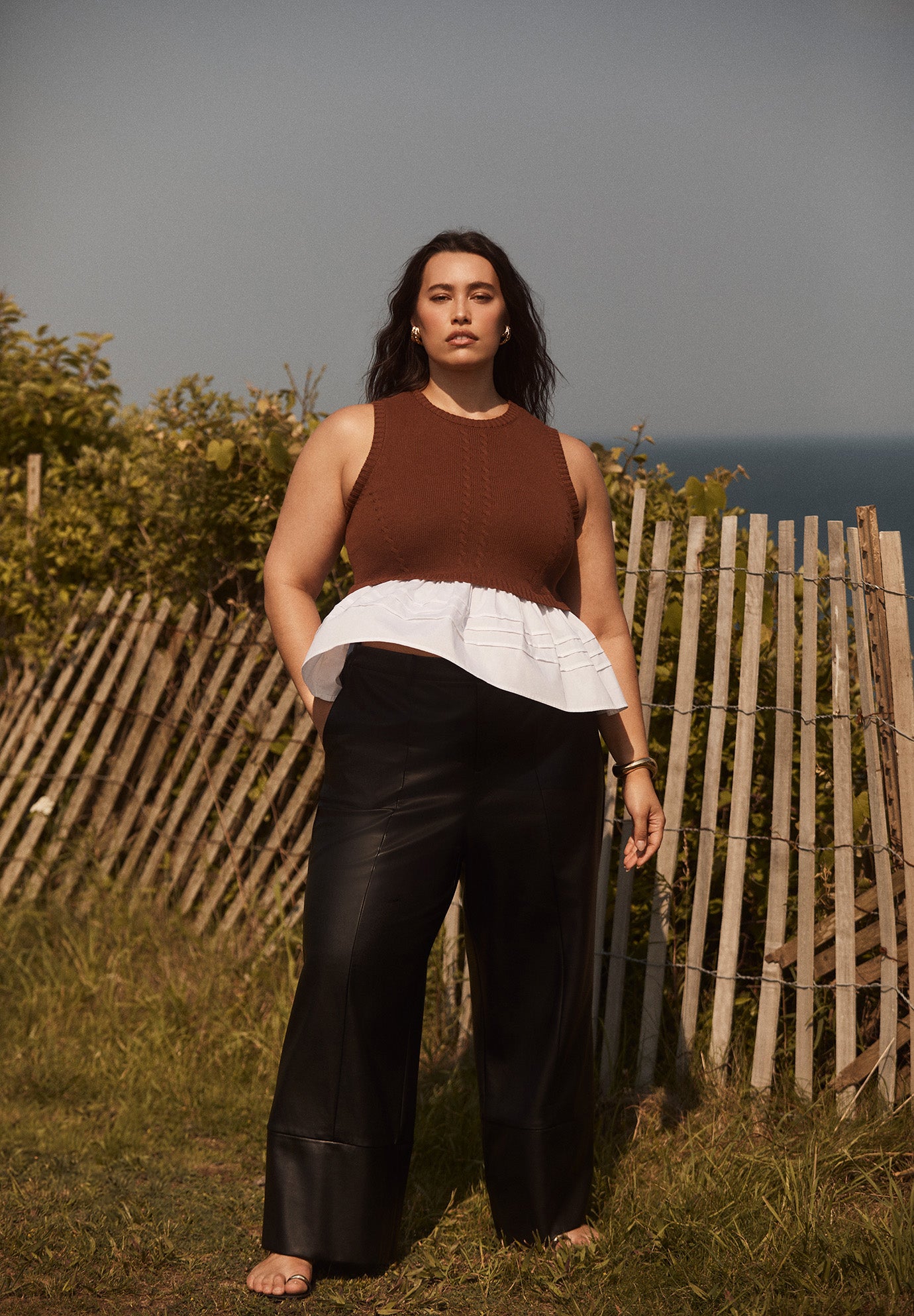 Sleeveless Peplum Sweater image number 0